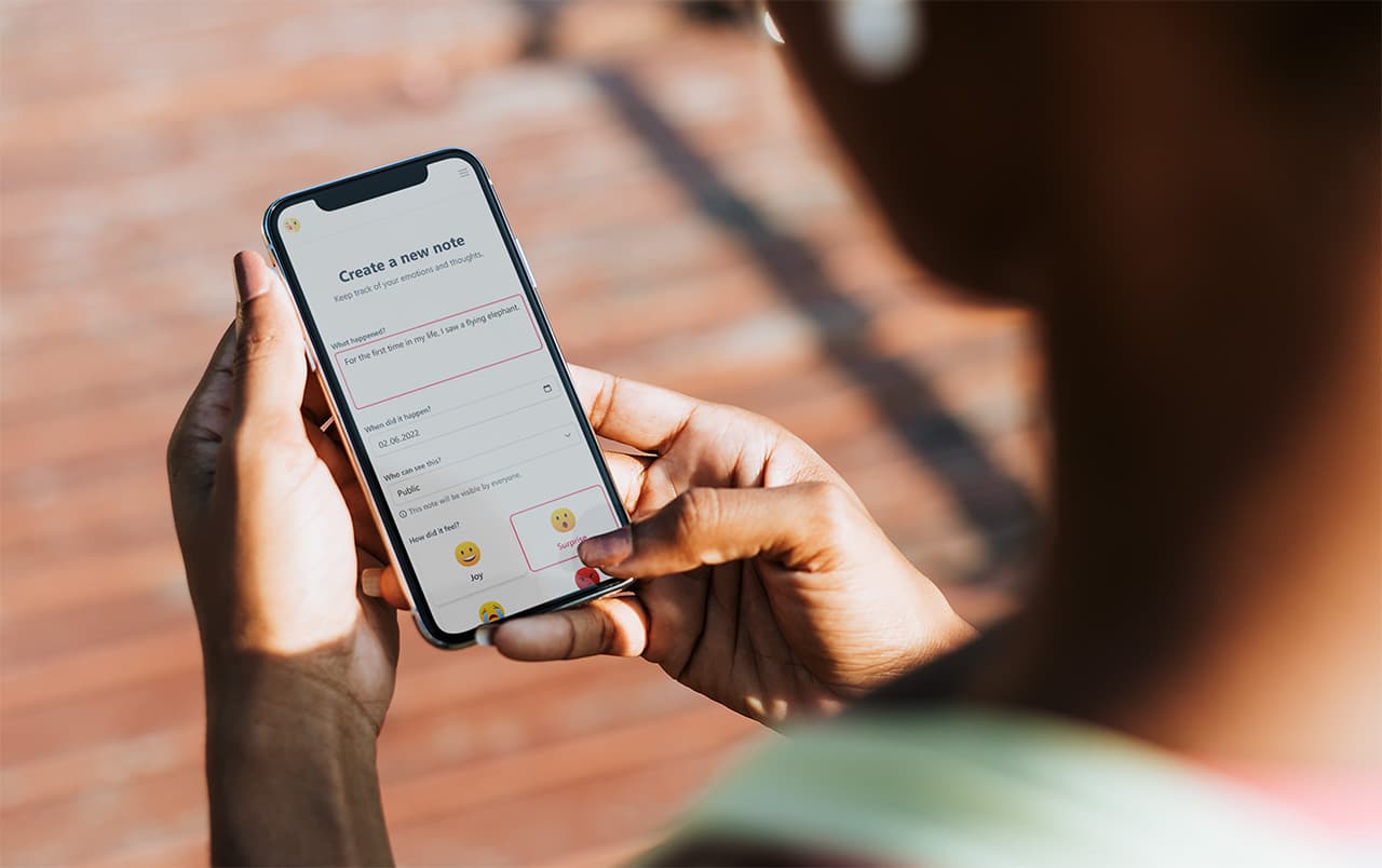 A person creating a note in the application